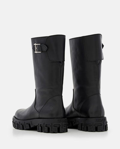 Shop Versace Belted Leather Boots In Black