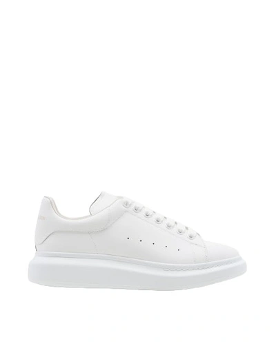 Shop Alexander Mcqueen Oversized Larry Sneakers In Leather In White