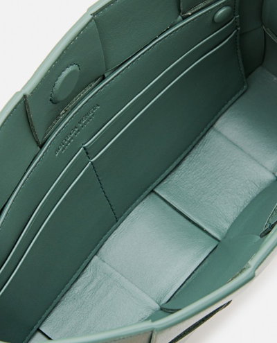 Shop Bottega Veneta Cassette Bag With Leather Shoulder Strap In Green