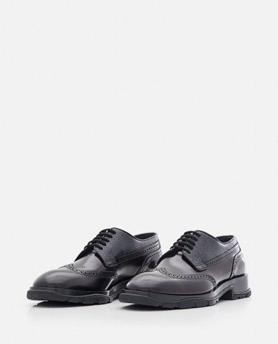 Shop Alexander Mcqueen Leather Brogue Shoes In Black