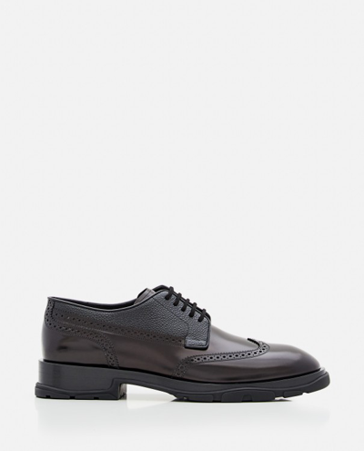 Shop Alexander Mcqueen Leather Brogue Shoes In Black