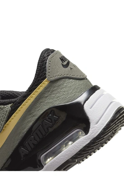 Shop Nike Kids' Air Max Systm Sneaker In Black/ Gold/ Stucco/ Black