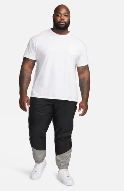 Nike Men's Windrunner Woven Lined Pants In Black/ Dark Stucco/ Saturn