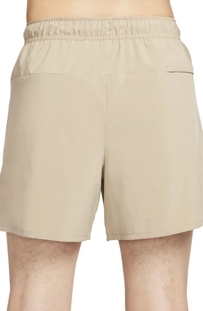 Shop Nike Dri-fit Unlimited 5-inch Athletic Shorts In Khaki/ Black/ Khaki