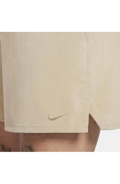 Nike Men's Unlimited Dri-fit 5" Unlined Versatile Shorts In Khaki/ Black/ Khaki