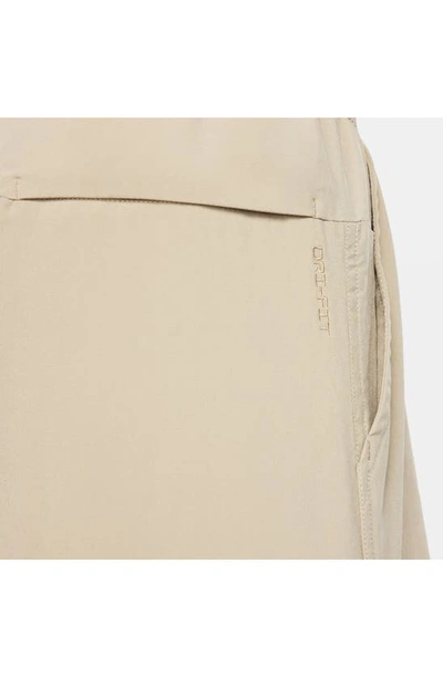 Nike Men's Unlimited Dri-fit 5" Unlined Versatile Shorts In Khaki/ Black/ Khaki