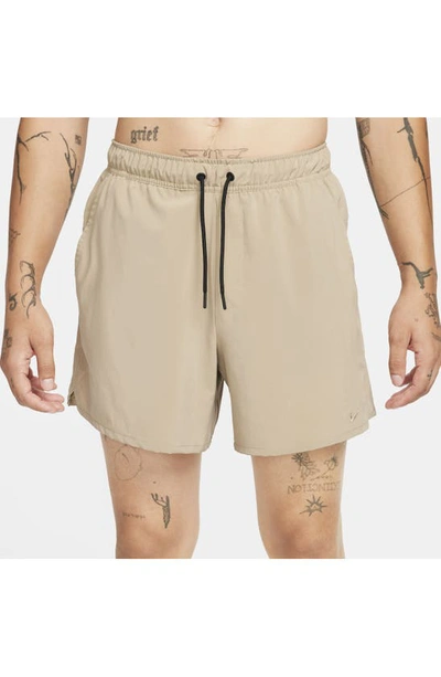 Nike Men's Unlimited Dri-fit 5" Unlined Versatile Shorts In Khaki/ Black/ Khaki