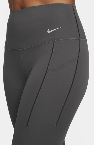 Shop Nike Universa Medium Support High Waist 7/8 Leggings In Medium Ash/black