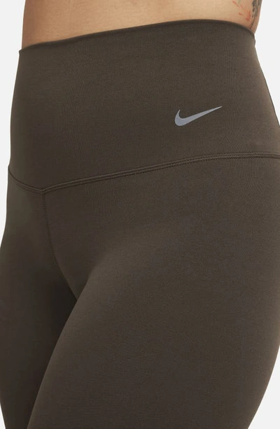 Shop Nike Zenvy Gentle Support High Waist Pocket Ankle Leggings In Baroque Brown/ Black