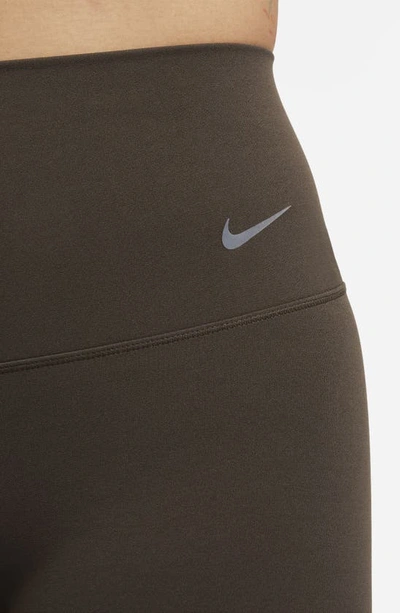 Shop Nike Zenvy Gentle Support High Waist Pocket Ankle Leggings In Baroque Brown/ Black