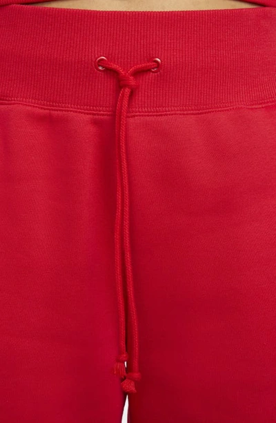 Shop Nike Sportswear Phoenix High Waist Fleece Sweatpants In University Red/ Sail
