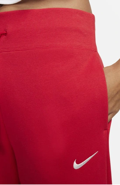 Shop Nike Sportswear Phoenix High Waist Wide Leg Sweatpants In University Red/ Sail