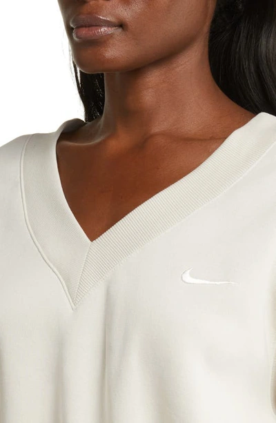 Shop Nike Sportswear Phoenix Fleece V-neck Crop Sweatshirt In Lt Orewood Brn/ Sail