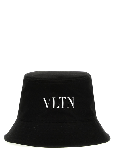 Shop Valentino Garavani Vltn Bucket Hat In White/black