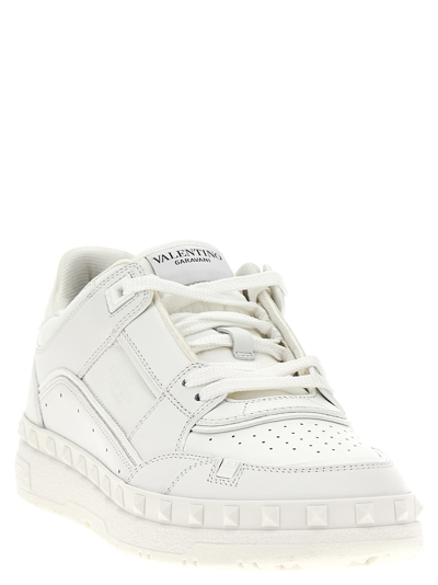 Shop Valentino Garavani Freedots Sneakers In White
