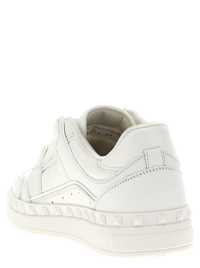 Shop Valentino Garavani Freedots Sneakers In White
