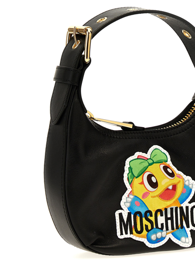 Shop Moschino Bubble Bobble Handbag In Black