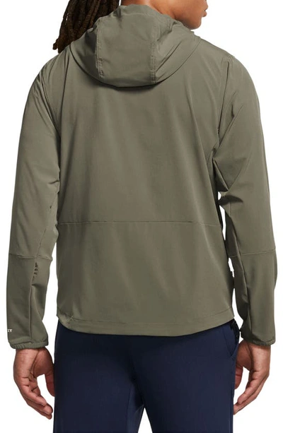 Shop Nike Repel Unlimited Dri-fit Hooded Jacket In Medium Olive/ Black