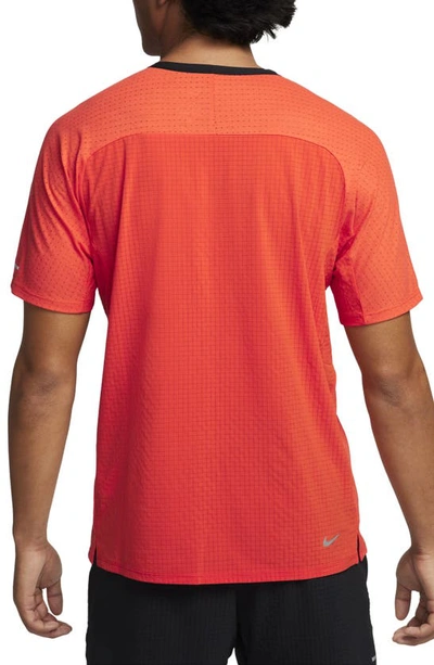Shop Nike Dri-fit Trail Solar Chase Performance T-shirt In Cosmic Clay/ Summit White