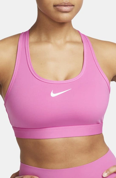Shop Nike Dri-fit Padded Sports Bra In Playful Pink/ White