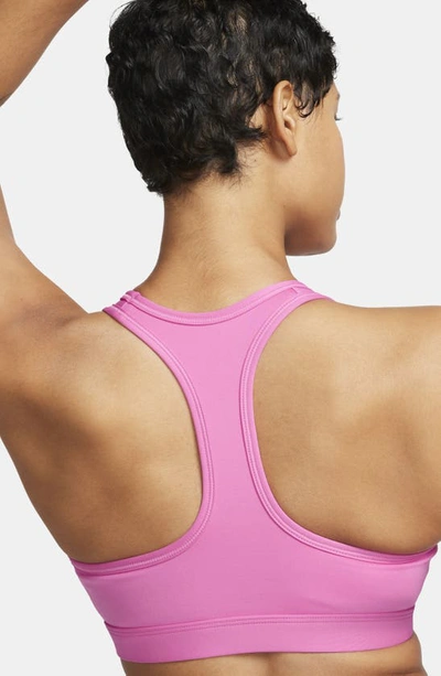 Shop Nike Dri-fit Padded Sports Bra In Playful Pink/ White