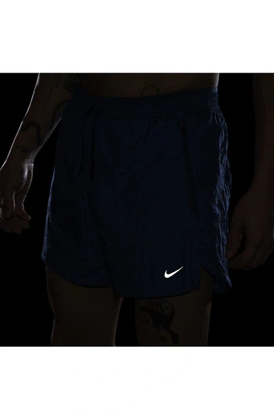 Shop Nike Dri-fit Stride Running Division Shorts In Court Blue/ Black