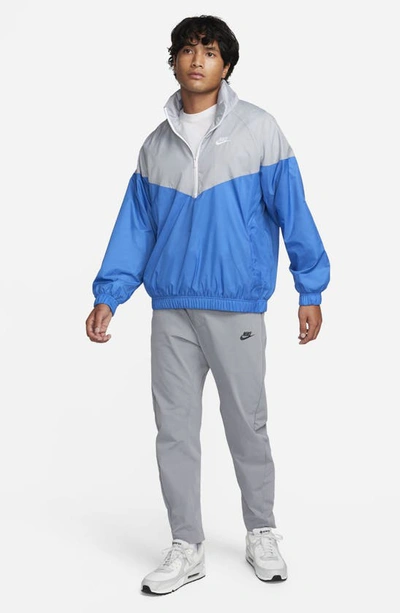 Shop Nike Water Repellent Half Zip Pullover In Wolf Grey/ Star Blue/ White