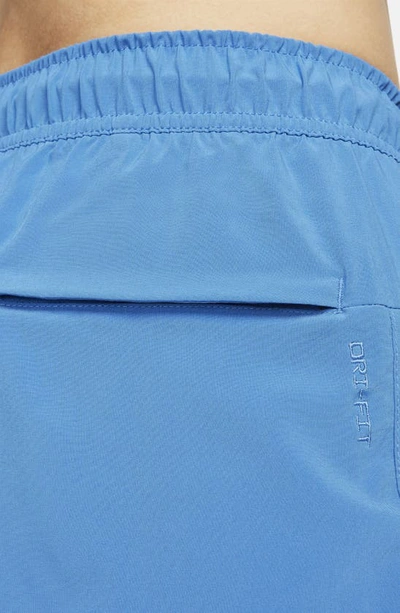 Shop Nike Dri-fit Unlimited 2-in-1 Versatile Shorts In Star Blue/ Court Blue/ Black
