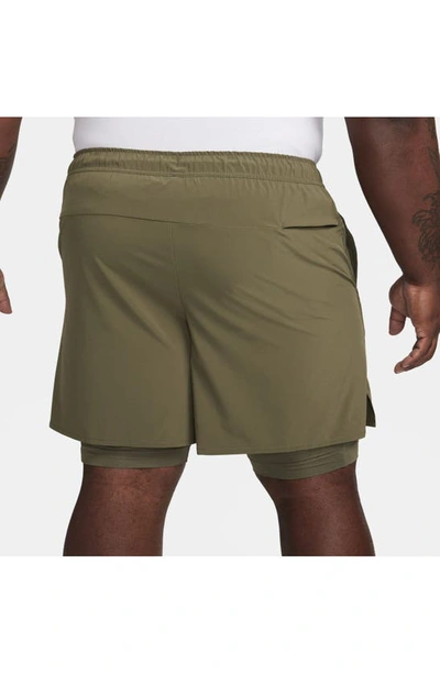 Shop Nike Dri-fit Unlimited 2-in-1 Versatile Shorts In Medium Olive/ Medium Olive