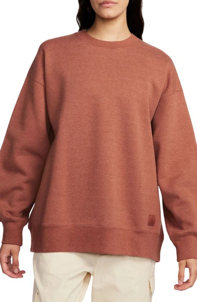 Shop Jordan Flight Fleece Oversize Crewneck Sweatshirt In Dusty Peach/ Heather