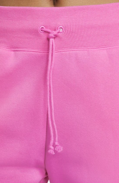Shop Nike Sportswear Phoenix High Waist Wide Leg Sweatpants In Playful Pink/ Sail