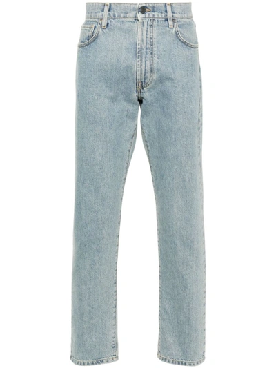 Shop Moschino Straight Jeans With Patch In Blue