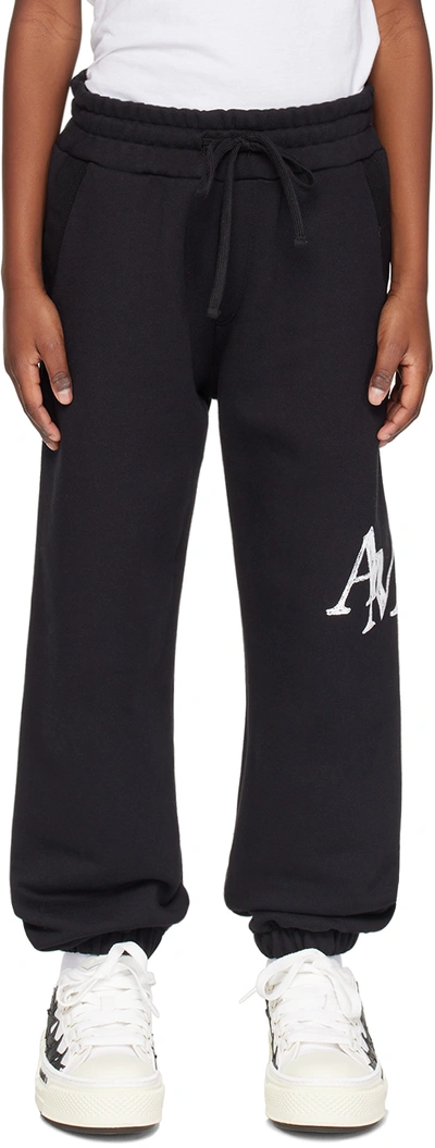 Shop Amiri Kids Black Staggered Scribble Sweatpants