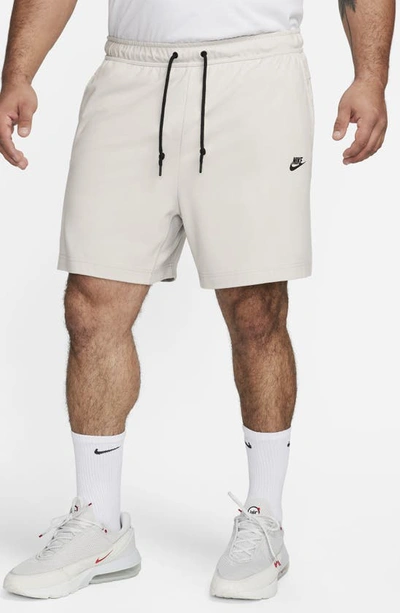 Shop Nike Lightweight Tech Knit Shorts In Light Iron Ore/ Black