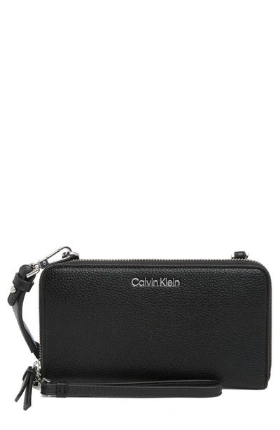 Shop Calvin Klein Marble Crossbody Bag In Black/ Silver