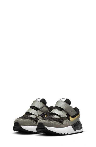 Shop Nike Kids' Air Max Systm Sneaker In Black/ Dark Stucco/ Gold