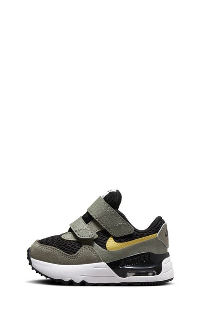 Shop Nike Kids' Air Max Systm Sneaker In Black/ Dark Stucco/ Gold