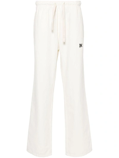 Shop Palm Angels Monogram Travel Pants In White