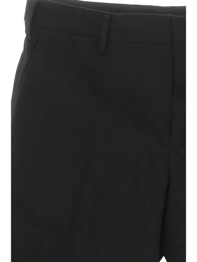 Shop Dries Van Noten Trousers In Black