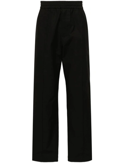 Shop Valentino Vlogo Cotton Trousers In Black