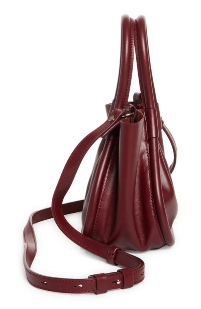 Shop Proenza Schouler X-small Ruched Leather Crossbody Tote In Garnet