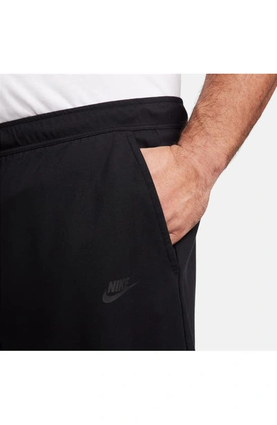 Shop Nike Lightweight Tech Knit Shorts In Black/ Black