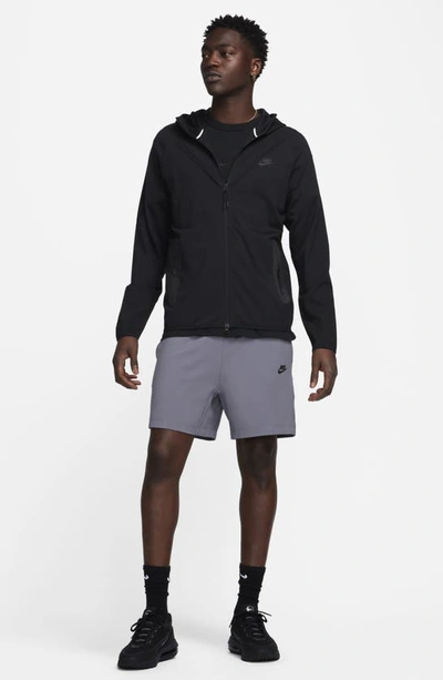 Shop Nike Lightweight Tech Knit Shorts In Light Carbon/ Black