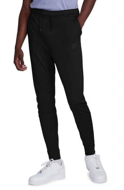 Shop Nike Lightweight Tech Knit Joggers In Black/ Black