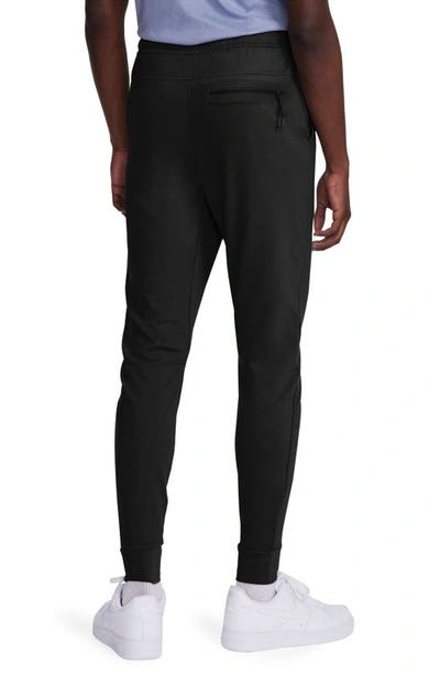 Shop Nike Lightweight Tech Knit Joggers In Black/ Black
