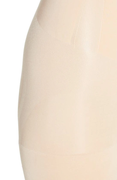 Shop Spanx Oncore Open Bust Mid Thigh Shaper Bodysuit In Soft Beige