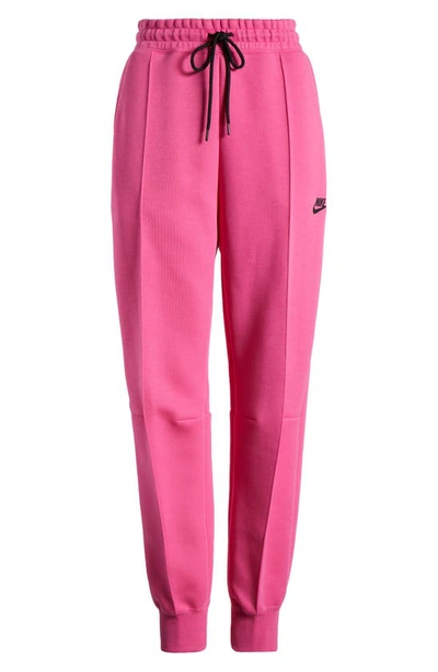 Nike Women's  Sportswear Tech Fleece Mid-rise Jogger Pants In Alchemy Pink/ Black