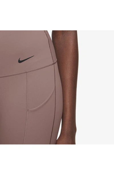 Shop Nike Universa Medium Support High Waist 7/8 Leggings In Smokey Mauve/ Black