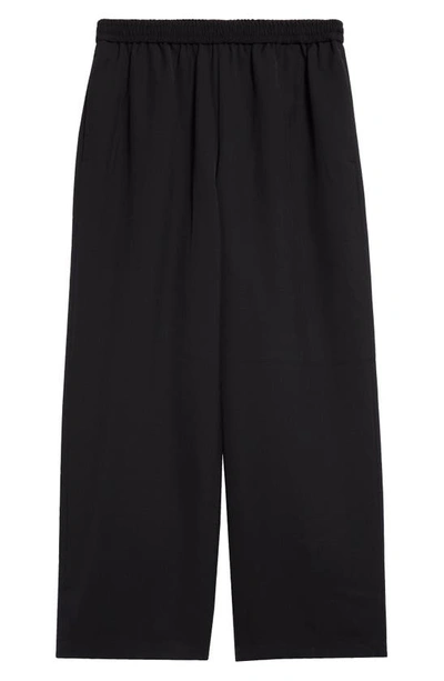 Shop Acne Studios Relaxed Wide Leg Pants In Black