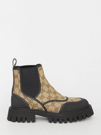 Shop Gucci Gg Fabric Ankle Boots In Beige